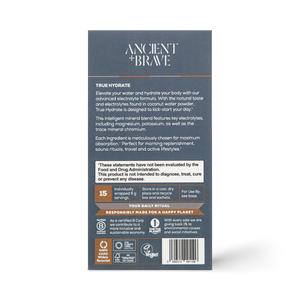 Back of an Ancient + Brave True Hydrate Sachets box, detailing its mineral electrolyte blend for active lifestyles, usage directions, Vegan and B Corp certifications, and disclaimers—all in white text on a dark background.