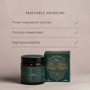 A jar and box of Ancient + Brave Triple Magnesium+ Capsules are shown on a beige surface. Above, checkmarked features read: Three bioavailable magnesium sources, Clinically researched, and High relaxation support.
