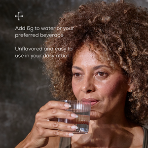 Woman holding a glass of water with text about adding a True Creatine to water or beverages.