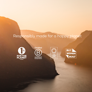 Sunset over mountains with sustainability certification logos and text 'Responsibly made for a happy planet'.