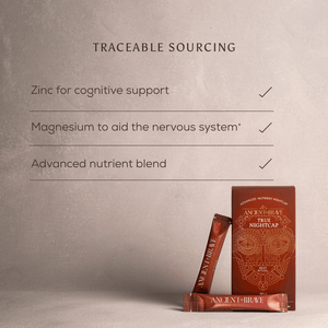 A product box and two sachets of Ancient + Brave True Nightcap are displayed on a beige surface. Text highlights the benefits: zinc for cognitive support, magnesium for the nervous system, and advanced nutrient blend.